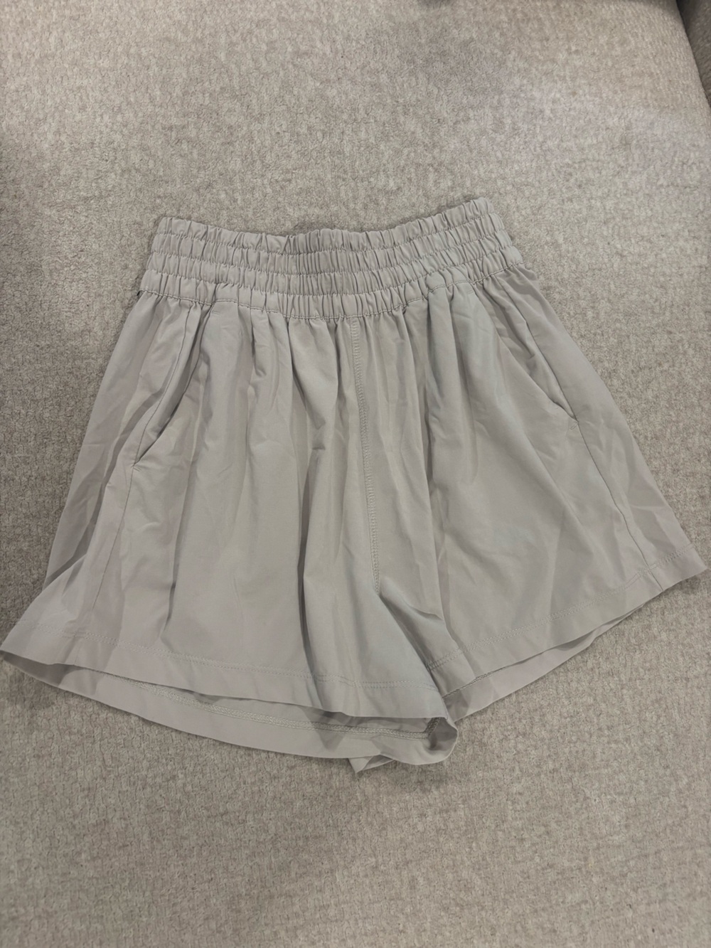 Vuori High-Waist Smocked Shorts in Light Gray